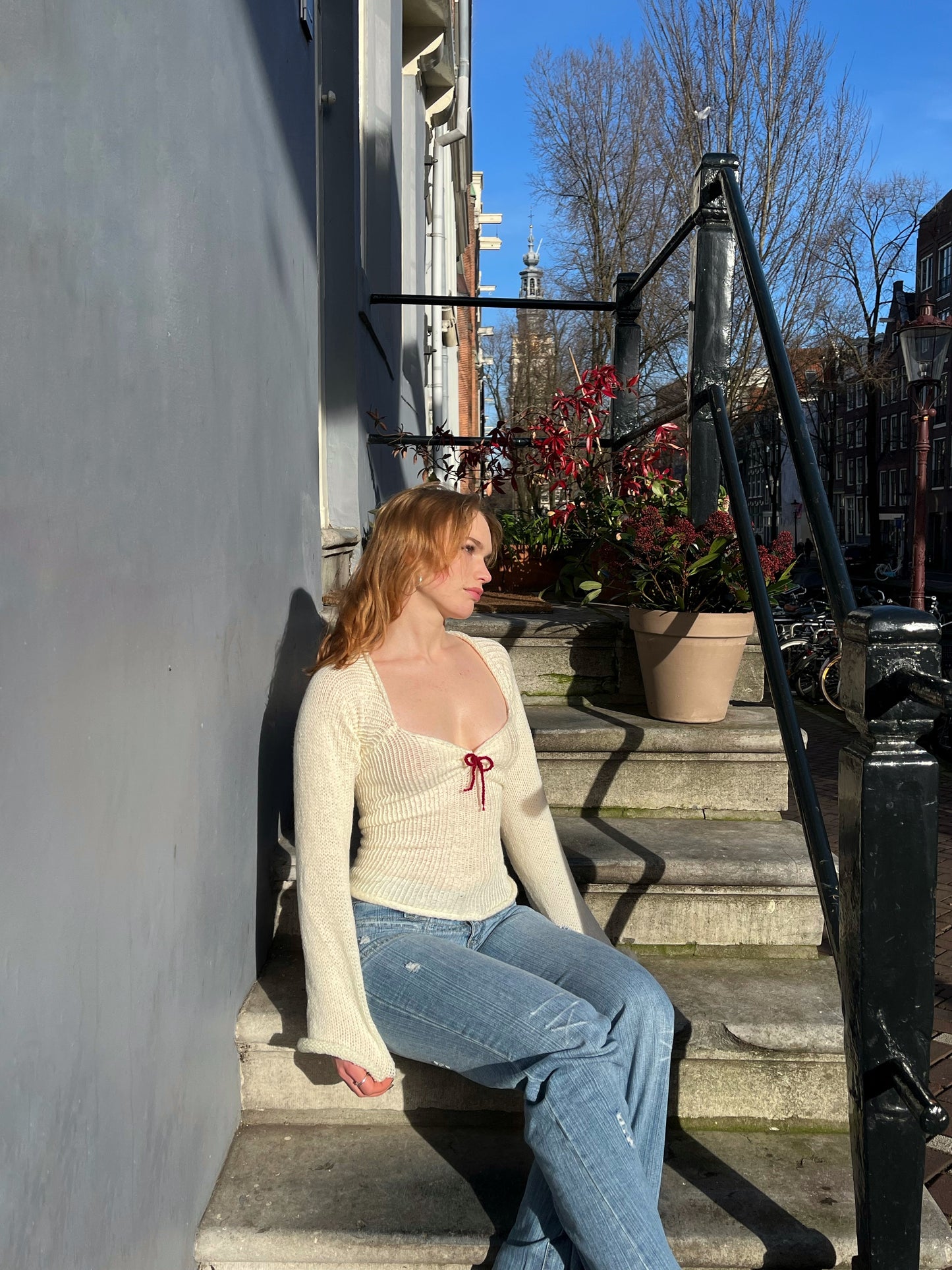 Pop of red open back top